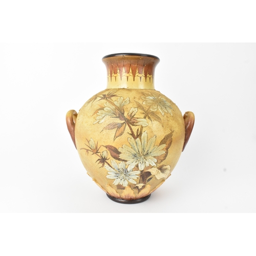 A late 19th century Doulton Lambeth Faience stoneware baluster vase by Florence E Lewis, in the Aesthetic taste with a decoration of a bird amongst flowers on a yellow ground, impressed and painted factory marks to the base, 26cm high x 24cm wide, A/F
If there is no condition report shown, please request