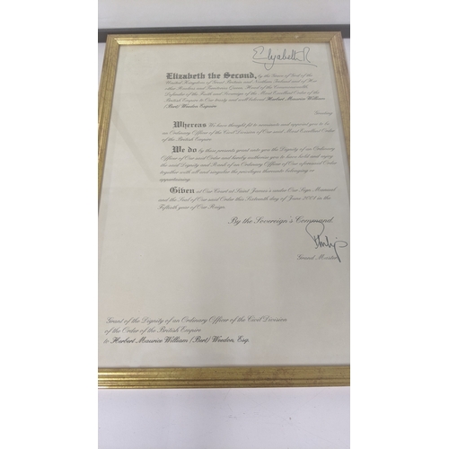 147A - *** THIS LOT HAS BEEN WITHDRAWN***A signed framed and glazed Order of the British Empire document si... 
