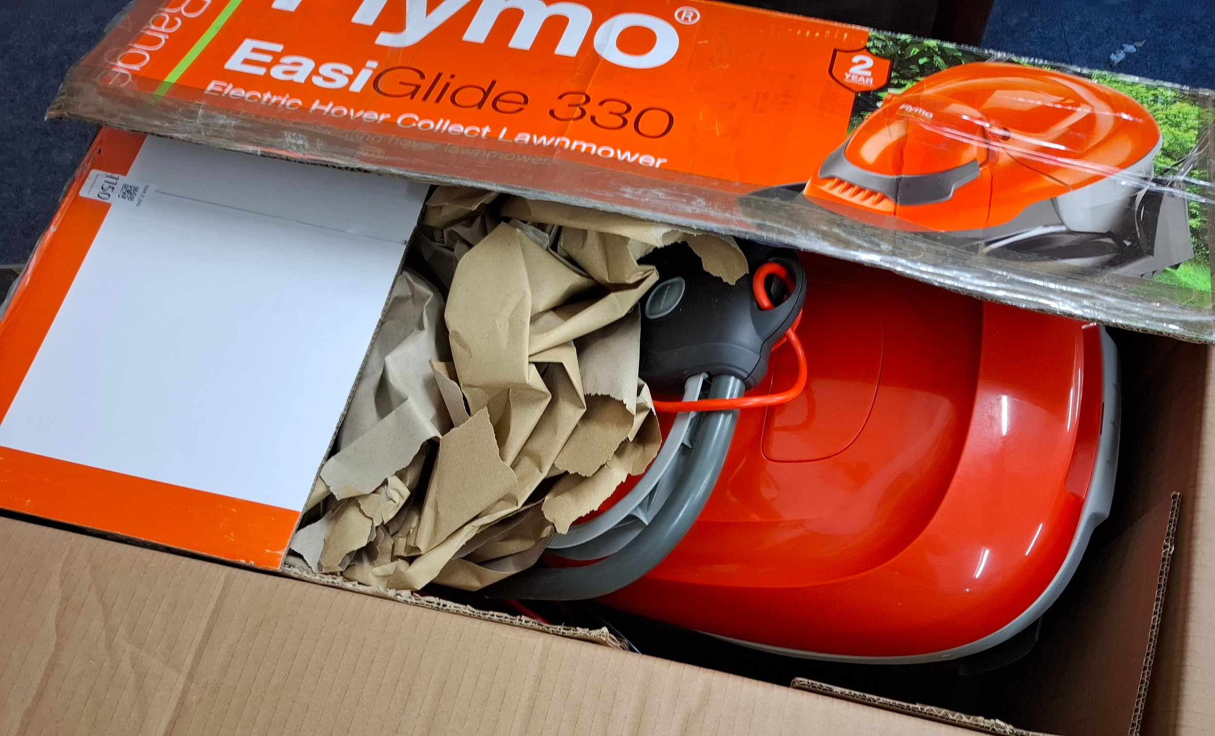 A Flymo Easy Glide 330 lawnmower in original box, appears un-used ...