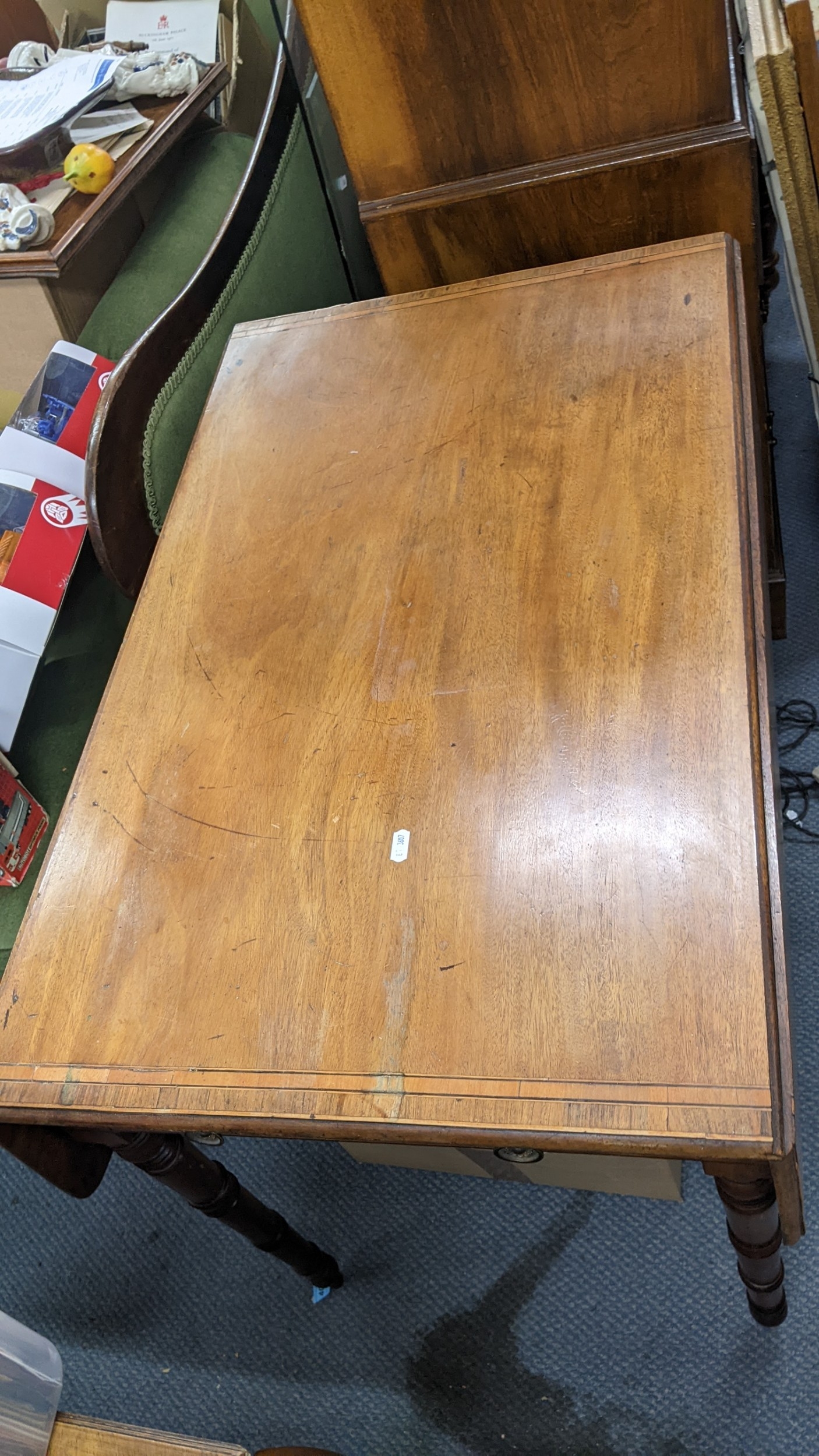 A Regency mahogany Pembroke table on splayed legs and a Victorian ...
