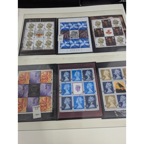 Five stamp albums filed with a quantity of British postage stamps with ...