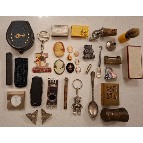 42 - A quantity of costume jewellery to include a silver tone chain with Disney pendant, silver tone and ... 