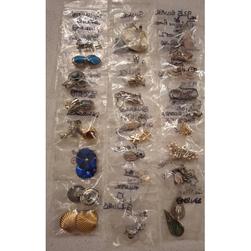 42 - A quantity of costume jewellery to include a silver tone chain with Disney pendant, silver tone and ... 