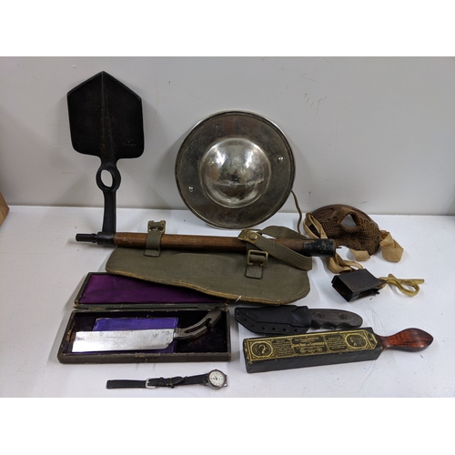 A mixed military lot to include WW2 British Sten Gun magazine loading ...