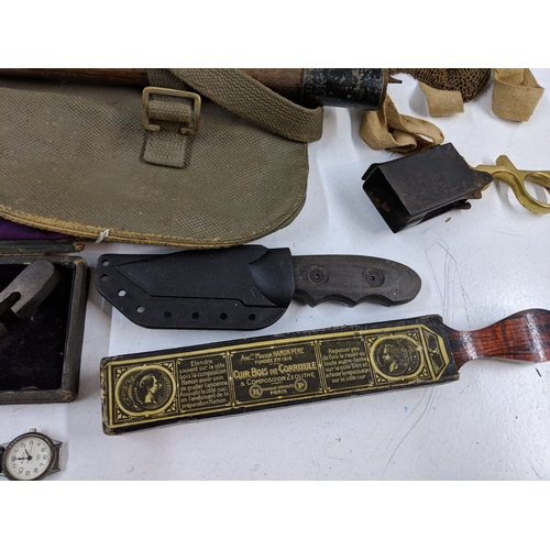 A mixed military lot to include WW2 British Sten Gun magazine loading ...