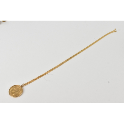1 - United Kingdom - Elizabeth II (1952-2022), 1968 Gold Sovereign, mounted in a 9ct gold frame and with... 