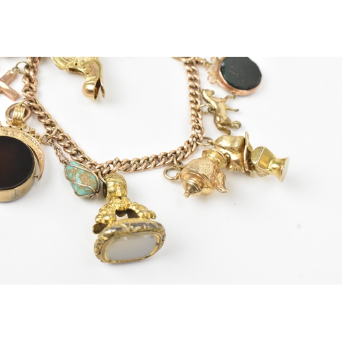 17 - A 9ct gold curb link charm bracelet, fitted with mixed charms to include fobs, teapot, boot, horse a... 