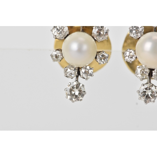 3 - A pair of pearl and diamond cluster earrings, each centred with a round pearl (possibly natural), me... 