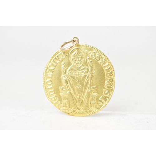 342 - An gold token, modelled as a replica Byzantine coin, tested as 18ct gold, of circular form depicting... 