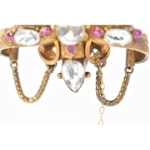 44 - A Victorian yellow metal brooch, unmarked, set with oval and pear-shaped aquamarines and accented wi... 