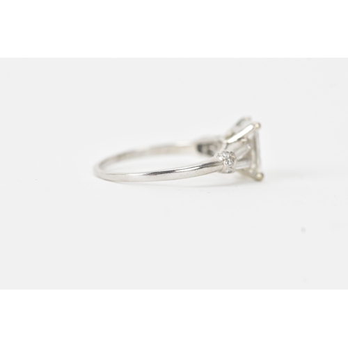 5 - A 1.47ct baguette cut diamond engagement ring, with De Beers Diamond Grading report stating the cent... 