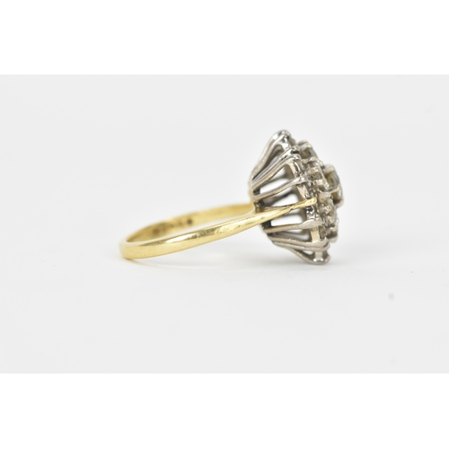 51 - A diamond 18ct gold cluster ring, the central brilliant-cut diamond measuring approximately 4.5mm di... 