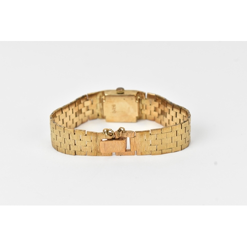 6 - An Accurist 9ct gold ladies manual wind wristwatch, the square dial having baton markers, on an arti... 