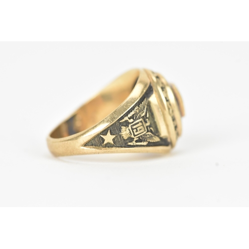 60 - A 10ct gold Marymount London class ring, set with a blue synthetic panel centred by a relief school ... 