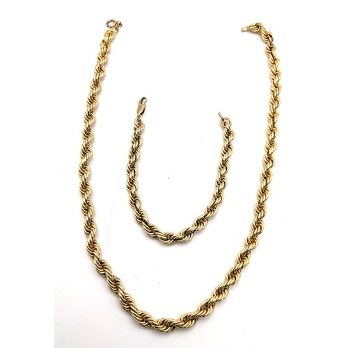 343 - A yellow gold necklace and matching bracelet, both 14ct gold with 9ct gold clasps, previously one ne... 