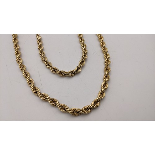 343 - A yellow gold necklace and matching bracelet, both 14ct gold with 9ct gold clasps, previously one ne... 