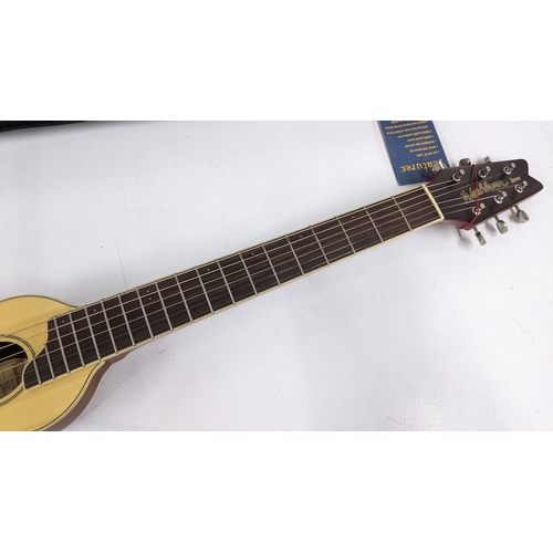 A Washburn Rover model R010 travel guitar with case, 84.5cm Location ...