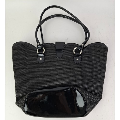 10 - Lulu Guiness- A black coated bag with rattan embroidered hummingbird and fuchsia design, 38cm wide x... 