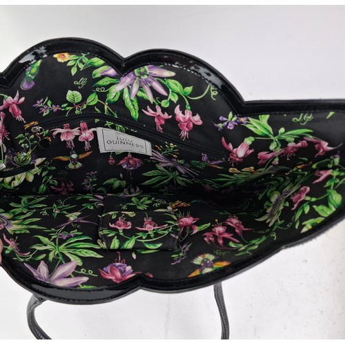 10 - Lulu Guiness- A black coated bag with rattan embroidered hummingbird and fuchsia design, 38cm wide x... 