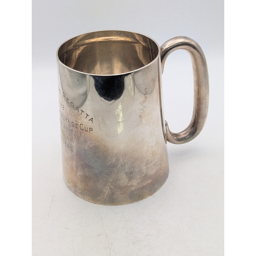 1 - A silver tankard having engraved inscription hallmarked London 1921, 277.8g
Location: P
If there is ... 