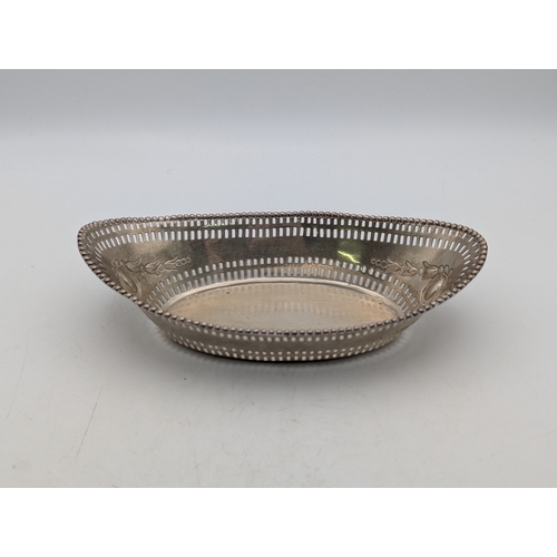 10 - A Victorian silver dish with pierced and embossed decoration in oval form hallmarked Birmingham 1899... 