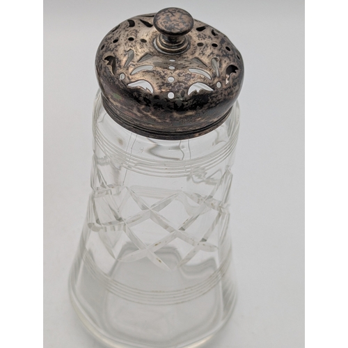 12 - A Victorian silver cream jug having floral embossed decoration hallmarked London 1898 together with ... 