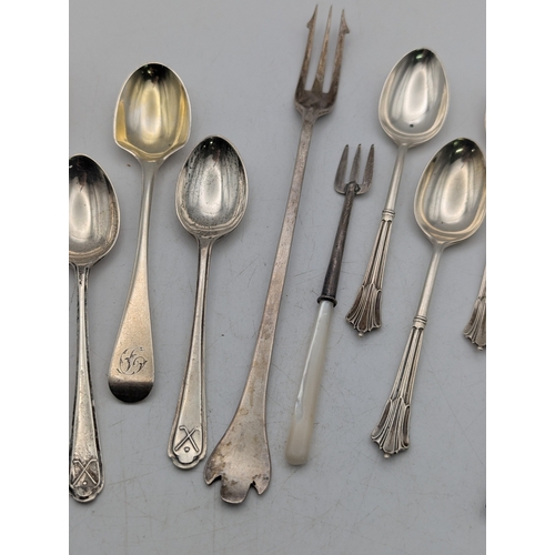 14 - Silver flatware to include pickle fork, assorted teaspoons and others, total weight 163.3g
Location:... 