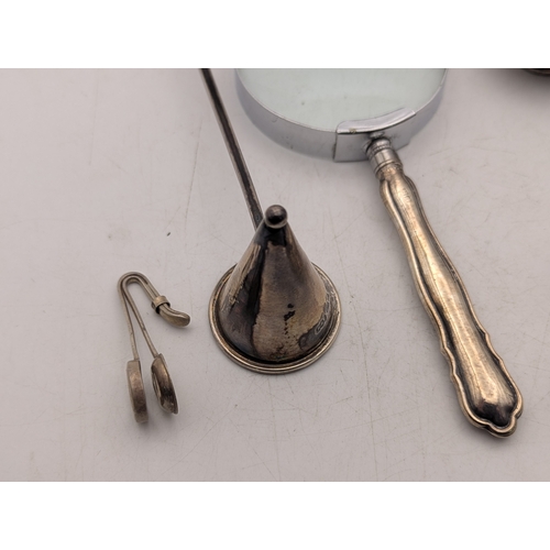 18 - Silver to include a candle snuffer, a cheroot case, a small powder pot, frog trinket and leaf sweate... 