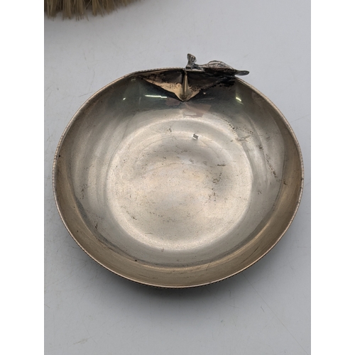 21 - Silver items to include a George V Deakin and Francis silver clad dressing table brush Birmingham 19... 