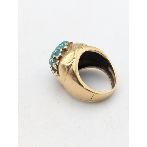 23 - A Victorian yellow gold and turquoise cluster ring tested as 18ct gold, size H, 8.4g
Location:R1
If ... 