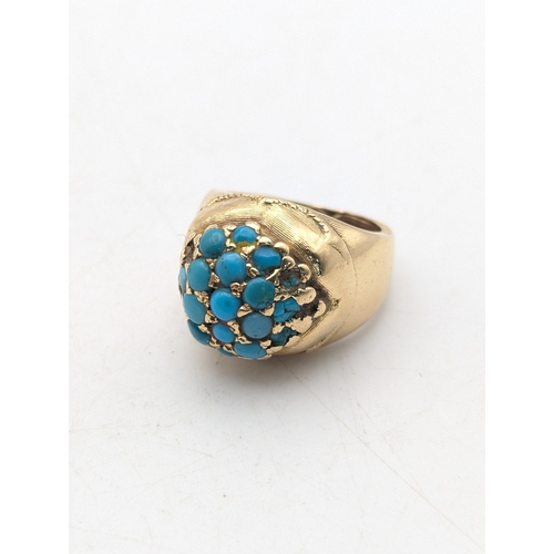 23 - A Victorian yellow gold and turquoise cluster ring tested as 18ct gold, size H, 8.4g
Location:R1
If ... 