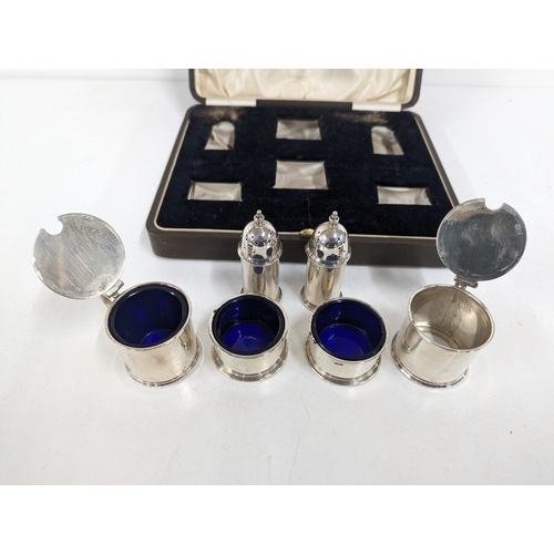 3 - Six silver condiment pots comprising of two salts, two lidded mustard pot (three with glass liners) ... 