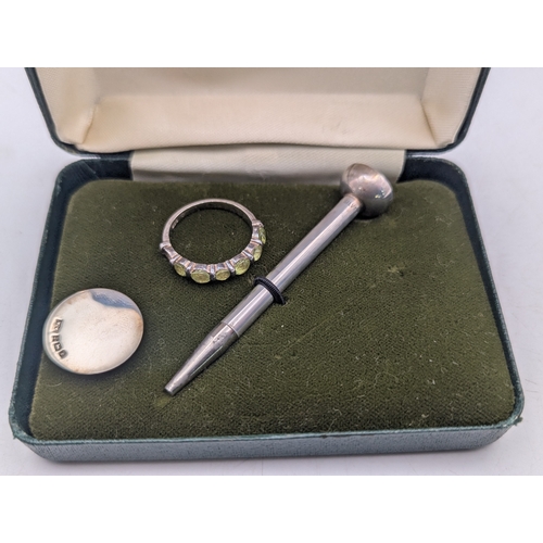 31 - Mixed silver items to include a Carrs of Sheffield photograph frame and desk clock, a ring and other... 