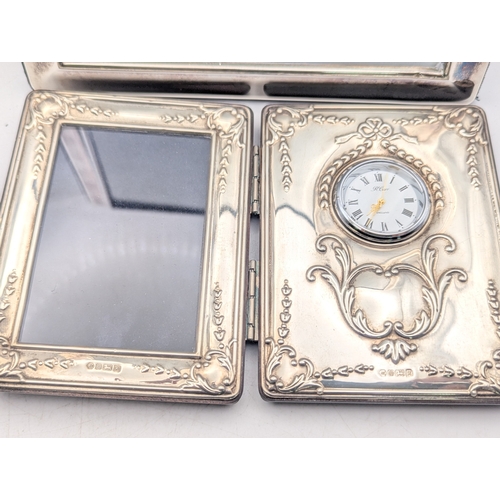 31 - Mixed silver items to include a Carrs of Sheffield photograph frame and desk clock, a ring and other... 