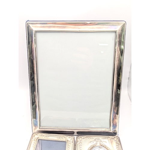 31 - Mixed silver items to include a Carrs of Sheffield photograph frame and desk clock, a ring and other... 