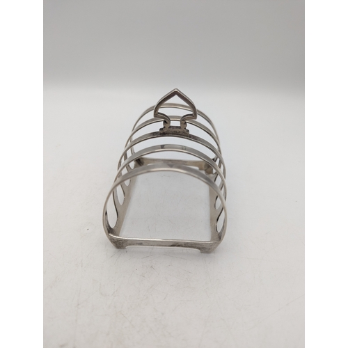 33 - A silver toast rack by Mappin and Webb hallmarked Sheffield 1947, 79.9g Location:A3B
If there is no ... 