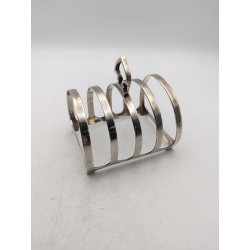 33 - A silver toast rack by Mappin and Webb hallmarked Sheffield 1947, 79.9g Location:A3B
If there is no ... 