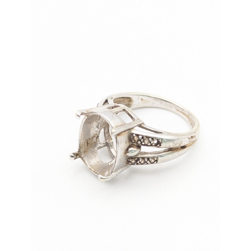 40 - A 9ct white gold ring set with paste stones to the shoulders on a tapering shank, 5.8g
Location:R1
I... 