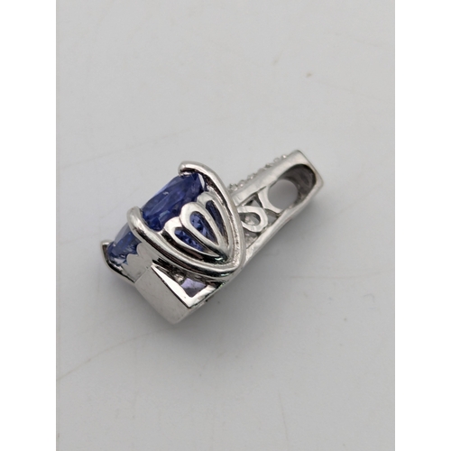 45 - A 18ct white gold tanzanite and diamond pendant, weight 2.7g
Location:C1
If there is no condition re... 
