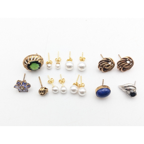 49 - 9ct yellow gold earrings to include a pair of knot style earrings along with examples set with diamo... 