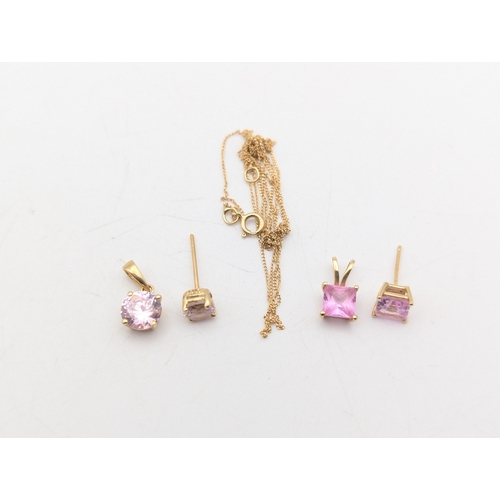 52 - 14ct yellow gold to include a fine necklace A/F, two pendants one set with pink sapphire and an earr... 