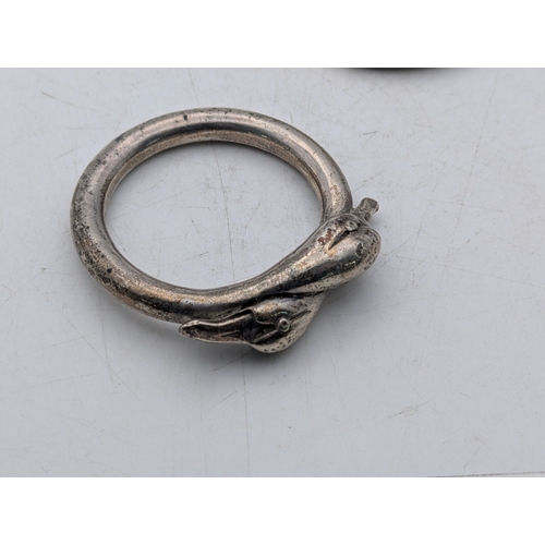 7 - Two silver napkin rings fashioned with swans, hallmarked London 2002, 127.8g
Location:A4B
If there i... 