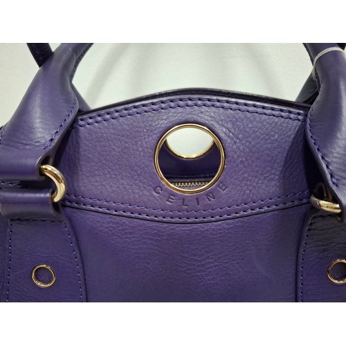 2 - Celine- A purple leather CE00/35 hand bag having silver tone hardware with ring design to the main b... 