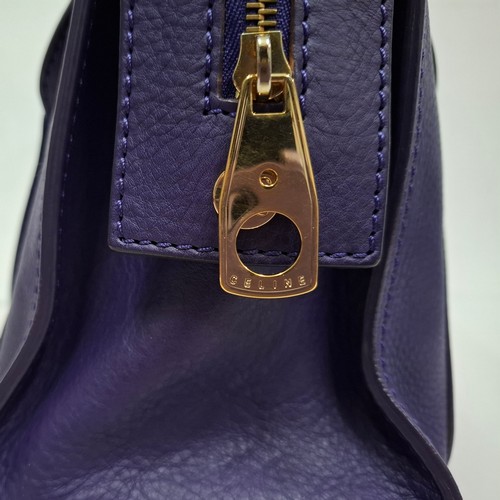 2 - Celine- A purple leather CE00/35 hand bag having silver tone hardware with ring design to the main b... 