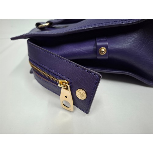 2 - Celine- A purple leather CE00/35 hand bag having silver tone hardware with ring design to the main b... 