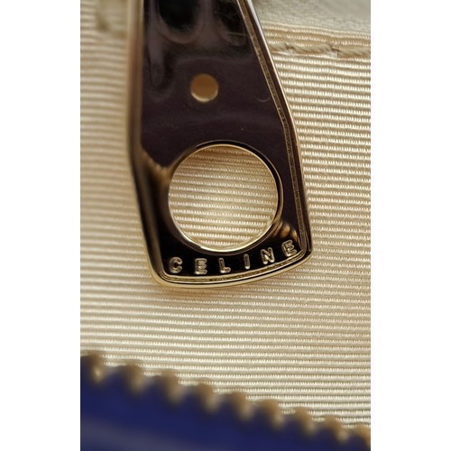 2 - Celine- A purple leather CE00/35 hand bag having silver tone hardware with ring design to the main b... 