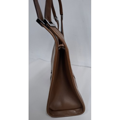 3 - Gucci- A brown Jackie Bardot leather shoulder bag having silver tone hardware, double handles, fabri... 