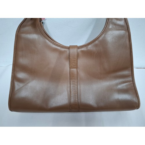 3 - Gucci- A brown Jackie Bardot leather shoulder bag having silver tone hardware, double handles, fabri... 
