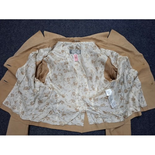 23 - Max Mara- A ladies tan suede box jacket having a white and tan floral lining, UK14. Location:Rail
Co... 