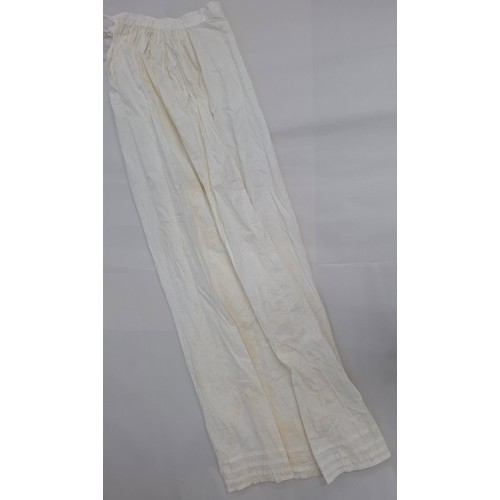 44 - A small quantity of vintage white cotton clothing comprising a petticoat 19